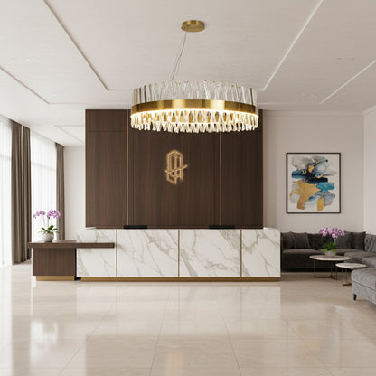 Gold metal chandelier with clear crystal rods glowing elegantly in a modern living space creating a luxurious bright and sophisticated interior atmosphere.