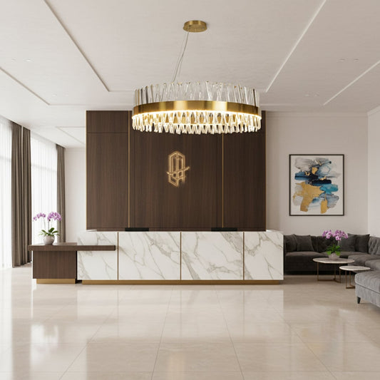 Gold metal chandelier with clear crystal rods glowing elegantly in a modern living space creating a luxurious bright and sophisticated interior atmosphere.