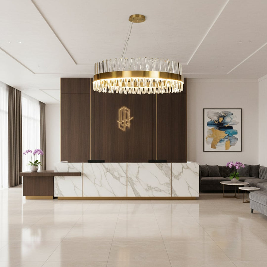 Gold metal chandelier with clear crystal rods glowing elegantly in a modern living space creating a luxurious bright and sophisticated interior atmosphere.