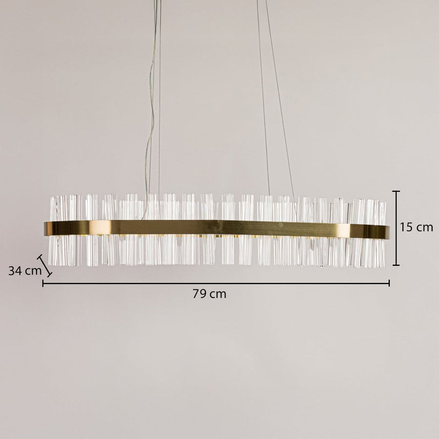 Gold metal chandelier shown with detailed measurements including 79 cm width 34 cm depth and 15 cm height for accurate installation and room planning.