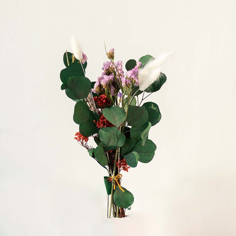 A fresh green preserved eucalyptus leaves and pink rose flower bouquet bundle for elegant luxury gifting on white backdrop.