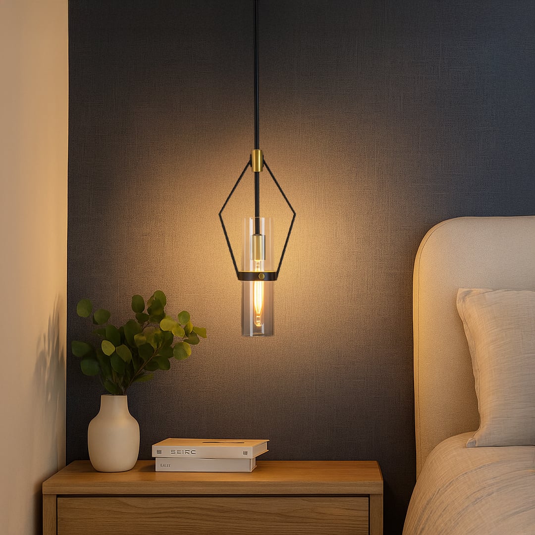 Modern black and gold geometric pendant light adding warm ambient lighting to a contemporary interior setting.