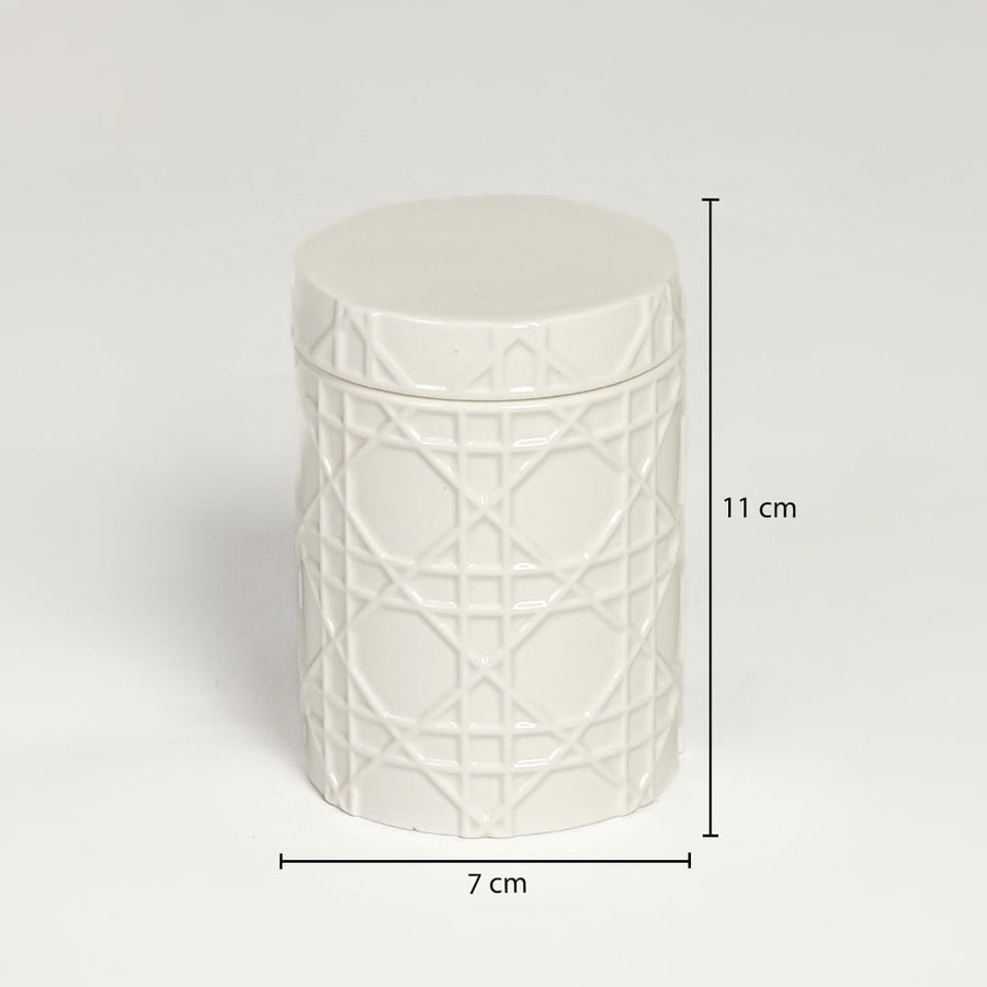 White ceramic textured candle holder measuring 11 cm height and 7 cm width ideal for modern tabletop decor styling.