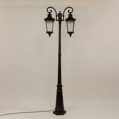 Vintage outdoor street lamp with dual lantern shades for elegant exterior decor styling use.