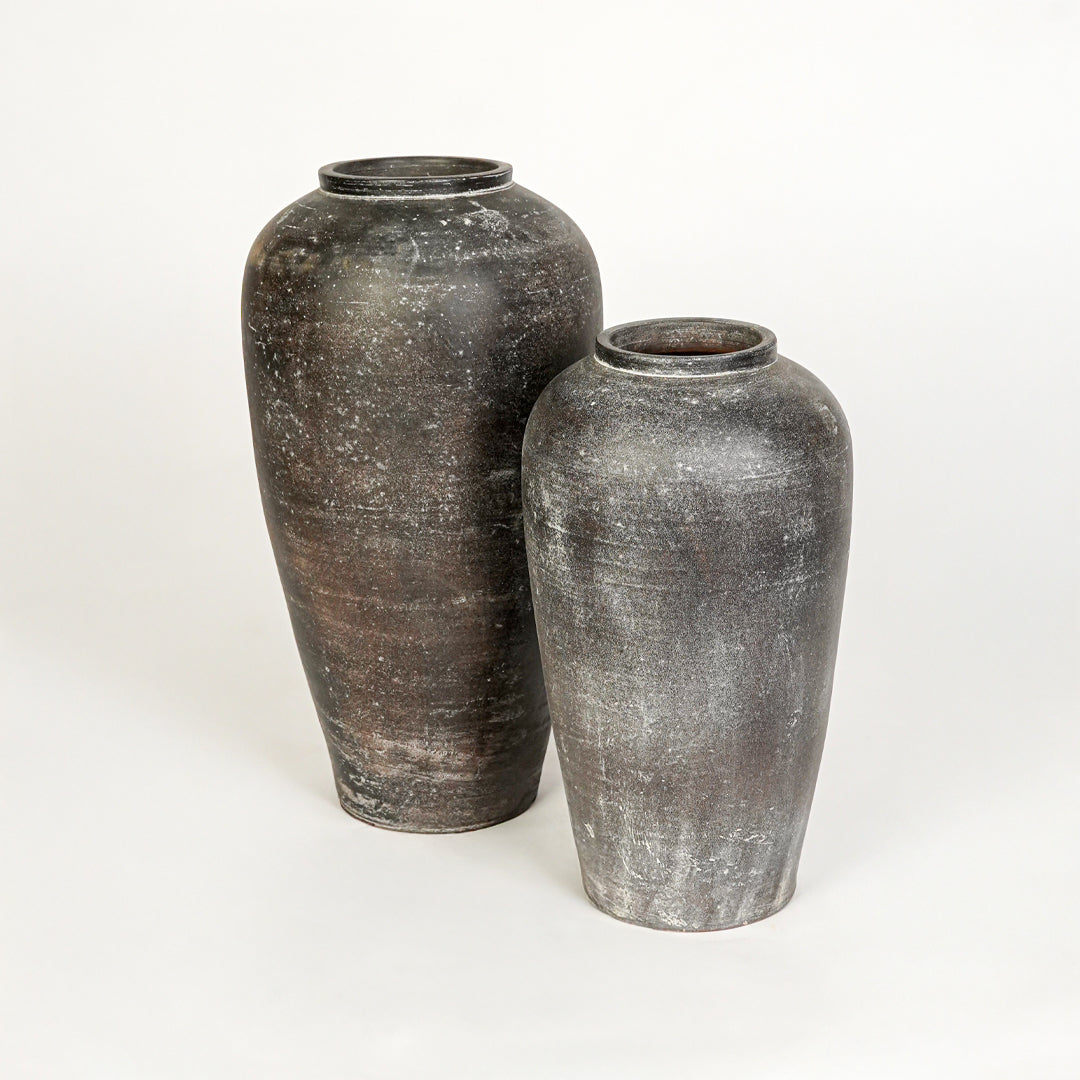 White background image of grey ceramic vase set for modern floor decor styling with artistic textured finish.