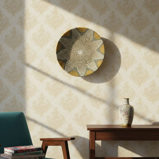 Textured round metal wall decor in antique gold tones mounted above console table adding layered depth and elegant indoor lifestyle styling.