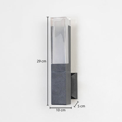 Modern outdoor wall light in metal and glass finish mounted on wall showing 29 cm height 10 cm width and 5 cm projection.