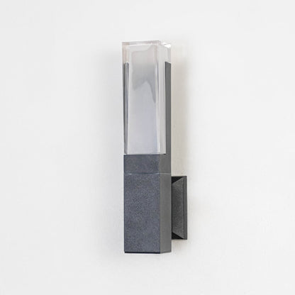 Minimal wall light with matte black frame and frosted diffuser displayed off on plain white background.