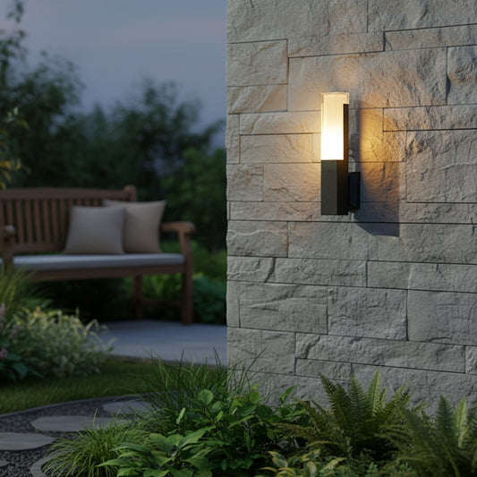Modern black outdoor wall light with frosted shade illuminating exterior wall for stylish architectural decor.