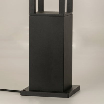 A closeup of the lower base of the bollard light showcasing the sturdy metal construction and smooth matte finish designed for durability in exterior environments.