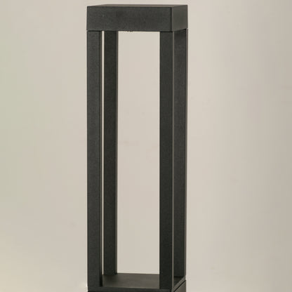 Closeup of black metal outdoor bollard light frame for modern exterior decor styling use.