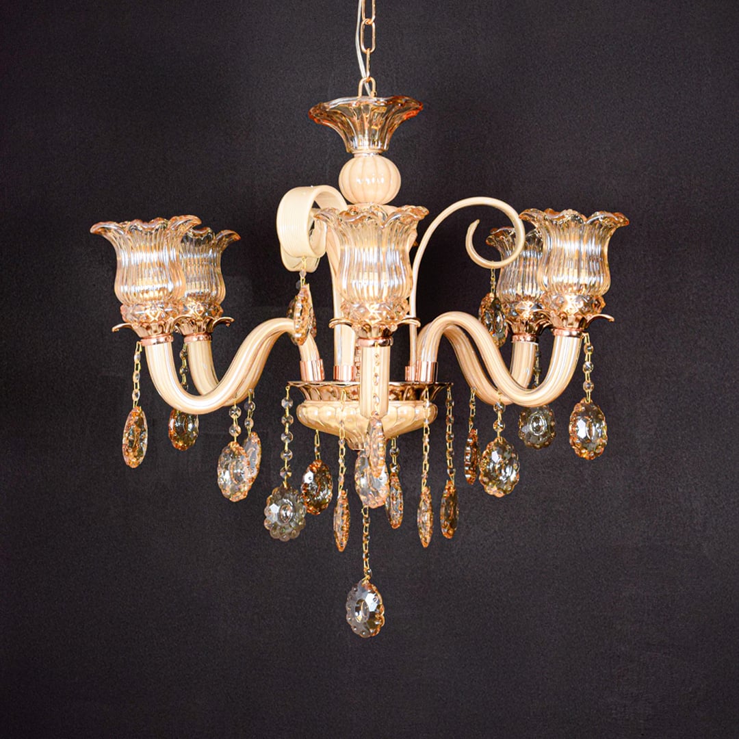 Golden glass crystal chandelier shown on black background highlighting rich elegant details for premium home decor.