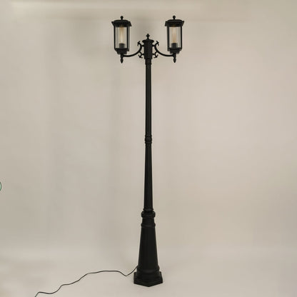 Outdoor garden post lamp with black metal body shown unlit on off white background suitable for pathway and landscape lighting.