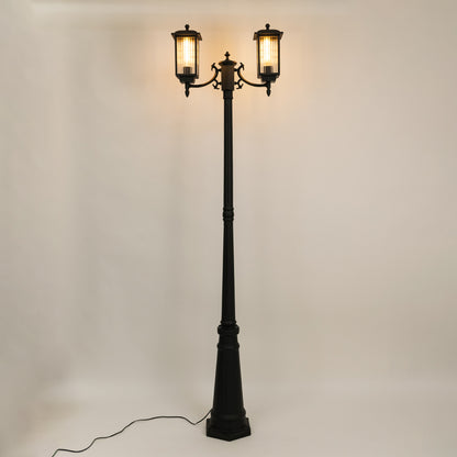 Vintage outdoor street lamp with dual glowing lanterns for elegant exterior decor styling use.