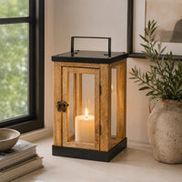 Lifestyle image of small brown wooden lantern for rustic patio decor styling and modern outdoor home garden lighting.