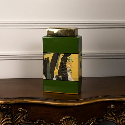 Green abstract jar displayed on a classic wooden console adding modern artistic charm to elegant home decor.