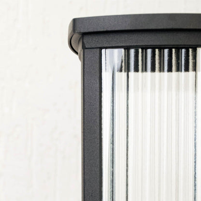 Black outdoor pillar light with frosted glass and strong base perfect for patio terrace garden and balcony lighting.