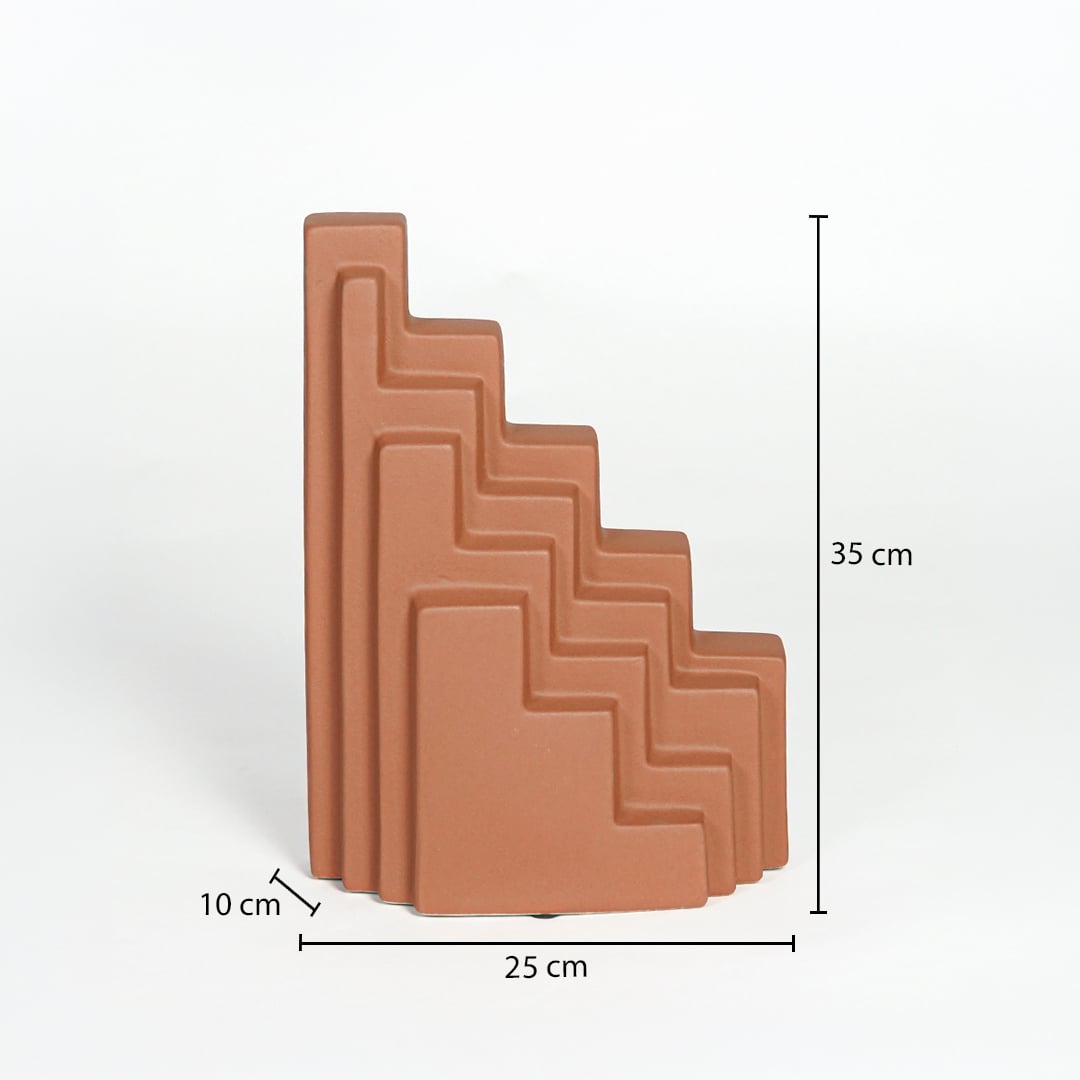 Orange ceramic stepped decorative sculpture measuring 35 cm height 25 cm width and 10 cm depth for modern shelf decor styling.