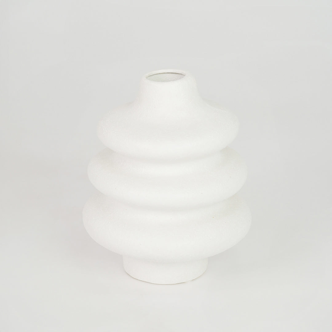 White textured ceramic vase for elegant coffee table placement and minimalist indoor home decor styling accent.