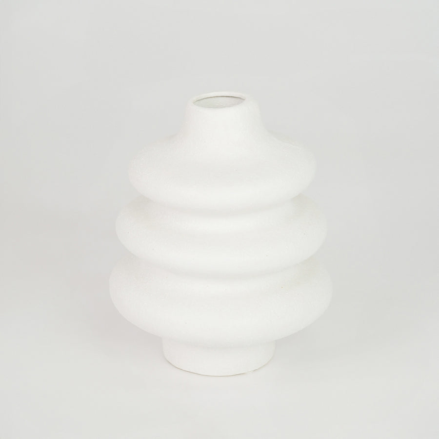White textured ceramic vase for elegant coffee table placement and minimalist indoor home decor styling accent.