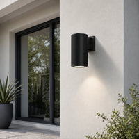 Minimal black metal up down outdoor wall light for porch entrance balcony and exterior walls with warm LED lighting.