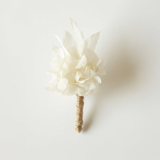 White background image of rihi boutonniere for elegant home interior decor styling and modern room tabletop decoration setup.