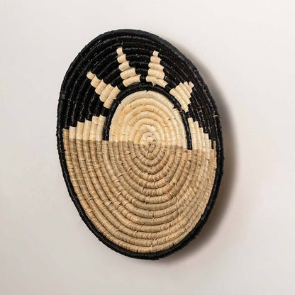 Dimension image of oval handcrafted seagrass wall basket with green leaf pattern for boho wall décor display.