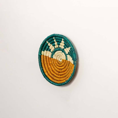 Natural seagrass wall basket set with green leaf pattern for modern boho living room wall décor styling.