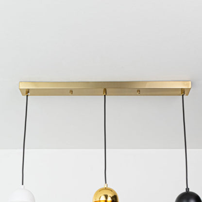 Gold metal linear canopy with suspended cords highlighting sleek modern craftsmanship and finish.