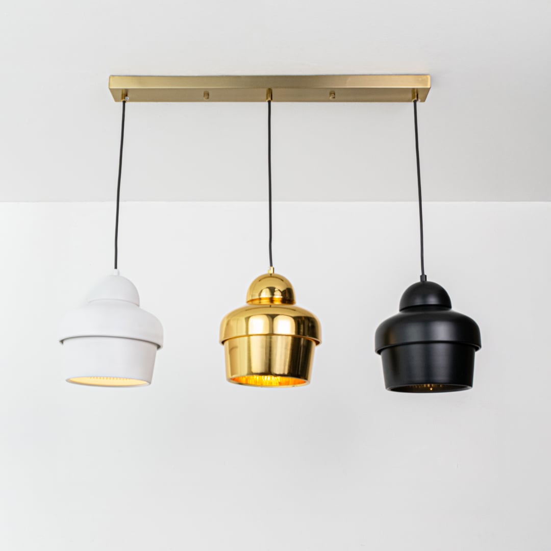 White gold and black metal pendant lights designed for stylish modern home decor interiors.