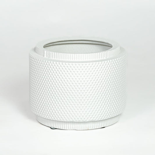 White ceramic planter with textured woven pattern and round shape isolated on white background for modern home decor use.
