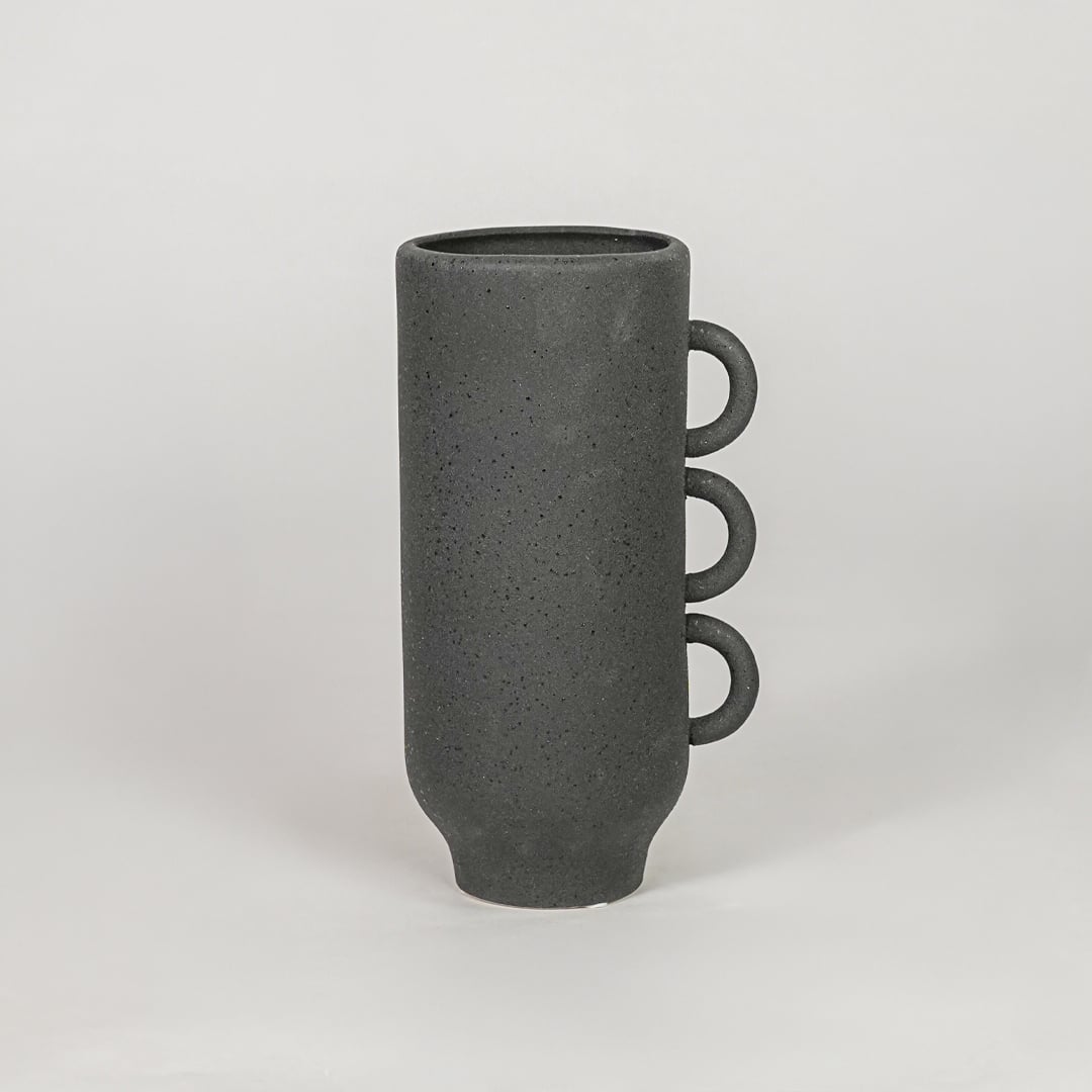 Black ceramic modern decorative flower vase isolated on clean white background stylish home decor vase for table shelf console use.