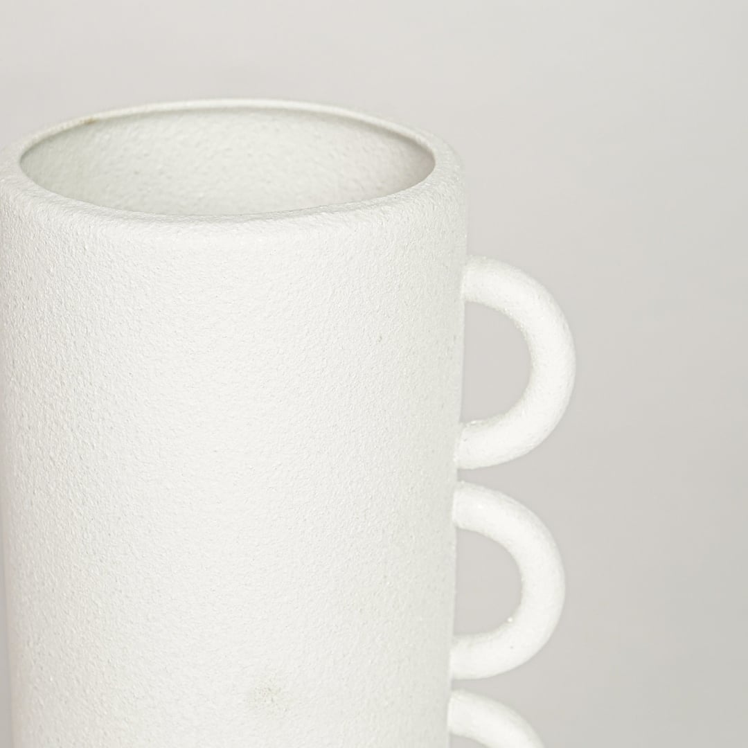 White ceramic decorative vase with textured matte surface and triple handle design perfect for elegant dried floral display.