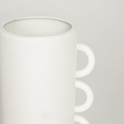 White ceramic decorative vase with textured matte surface and triple handle design perfect for elegant dried floral display.