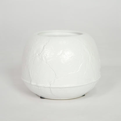 White textured ceramic planter pot for elegant coffee table placement and minimalist indoor home decor styling accent.