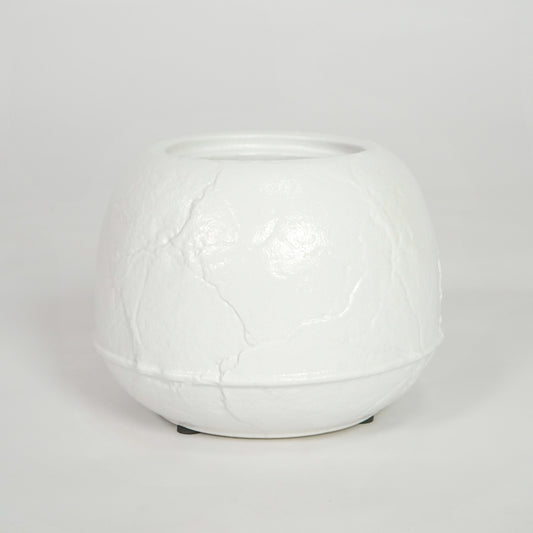 White textured ceramic planter pot for elegant coffee table placement and minimalist indoor home decor styling accent.