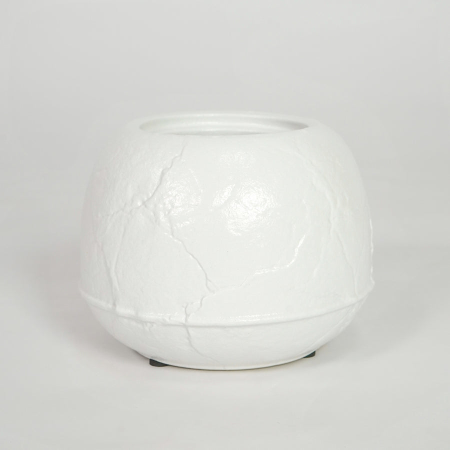 White textured ceramic planter pot for elegant coffee table placement and minimalist indoor home decor styling accent.