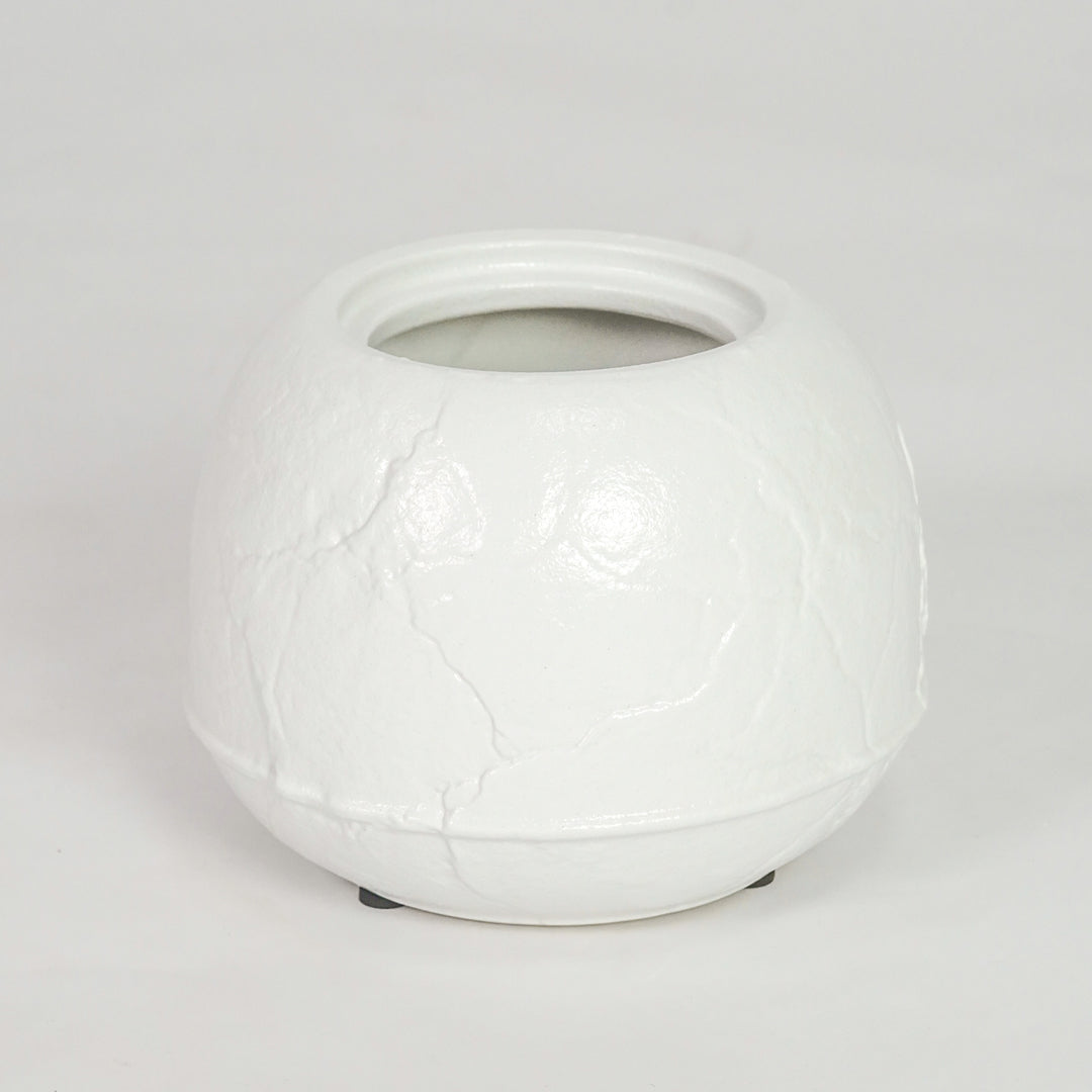 White ceramic planter pot for modern console table placement and stylish indoor decor styling accent display piece.