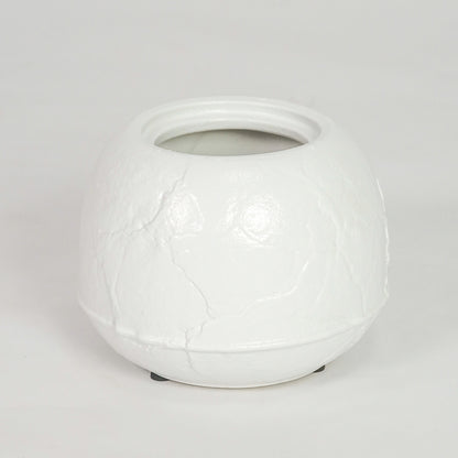White ceramic planter pot for modern console table placement and stylish indoor decor styling accent display piece.