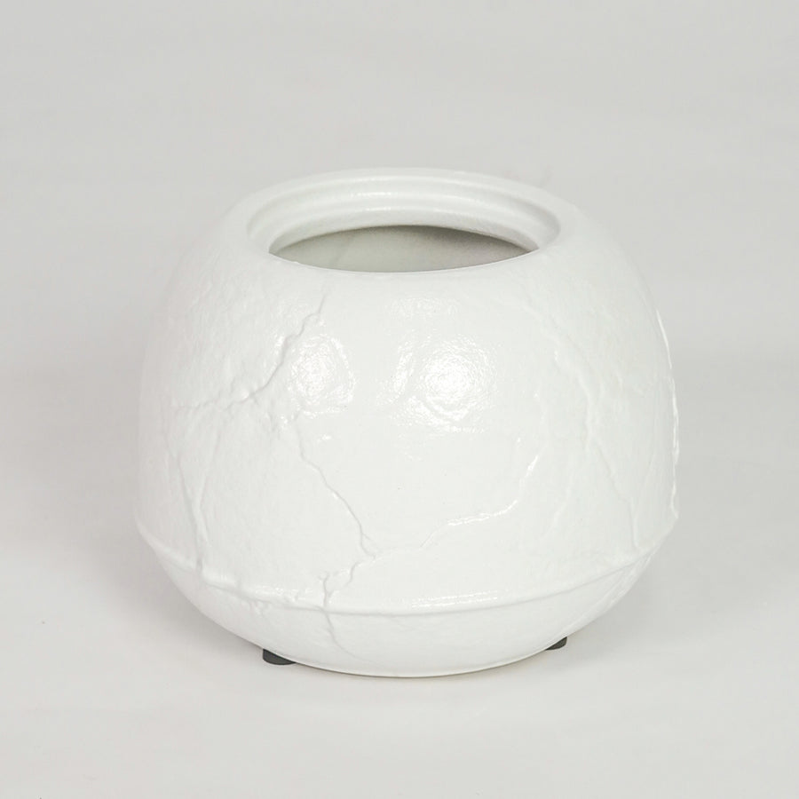 White ceramic planter pot for modern console table placement and stylish indoor decor styling accent display piece.
