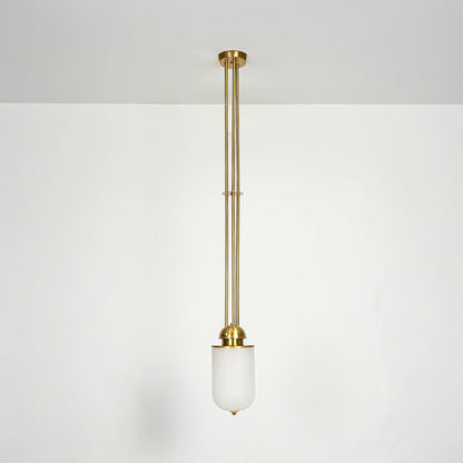 Gold metal and white glass pendant light designed for elegant dining room and living spaces.