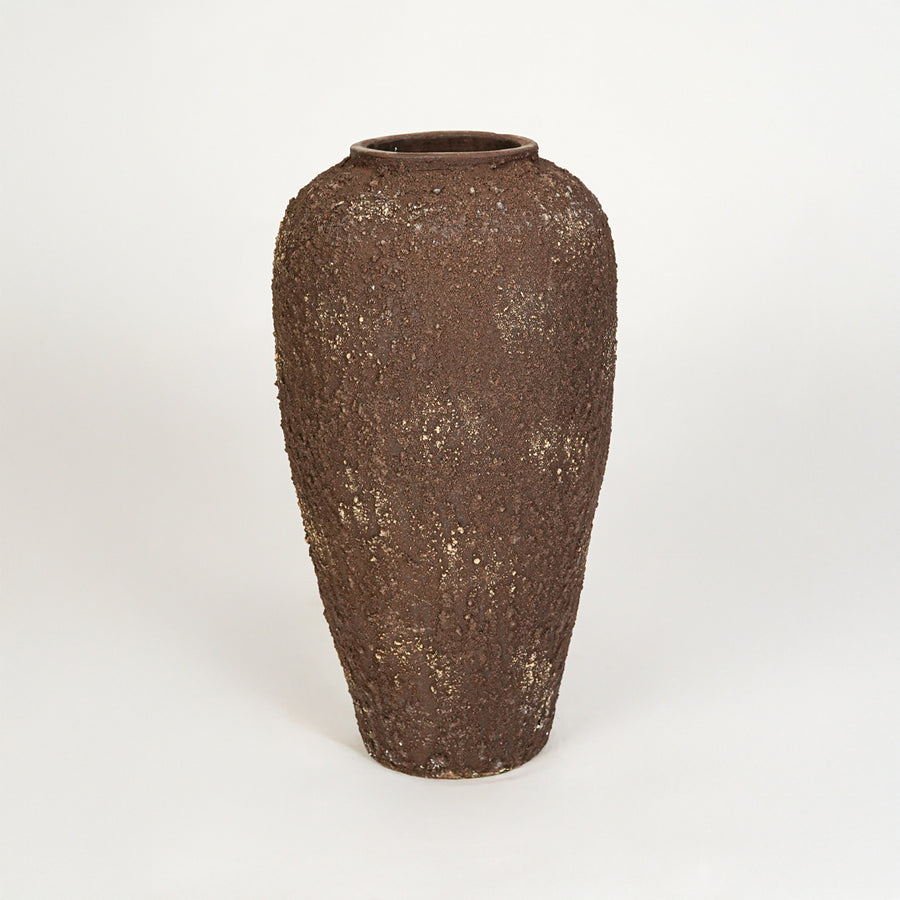 White background image of brown ceramic floor vase for elegant interior decor styling with rustic textured finish.