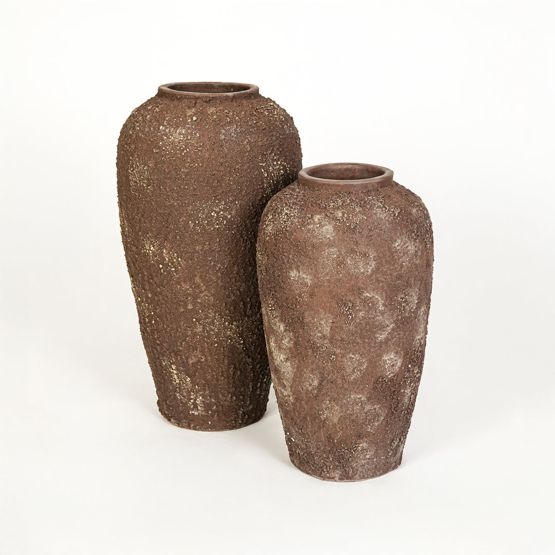 White background image of brown ceramic vase set for elegant interior decor styling with rustic textured finish.