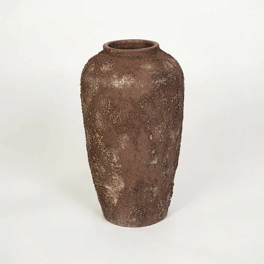 White background image of brown ceramic floor vase for elegant interior decor styling with textured finish.