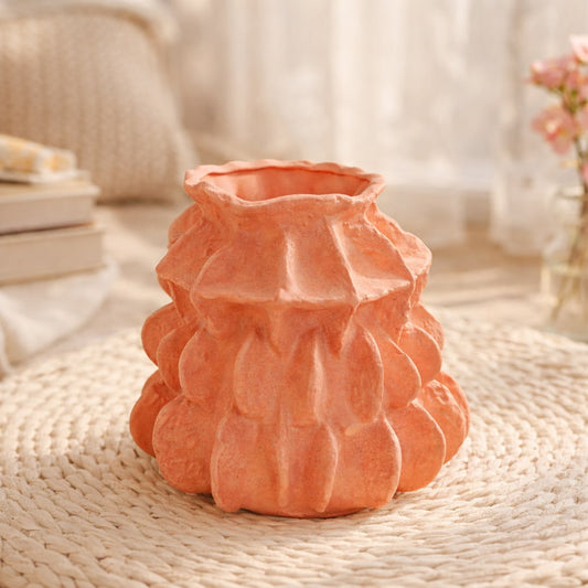Terracotta ceramic textured decorative vase with sculpted petal design perfect for dried flower display on console table and modern home decor.