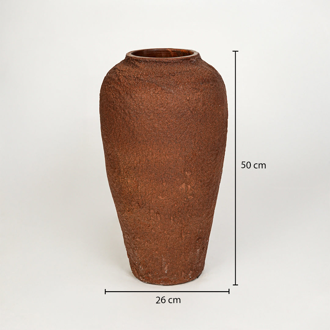 Dimension image of terracotta ceramic floor vase for rustic home decor styling with textured matte finish.