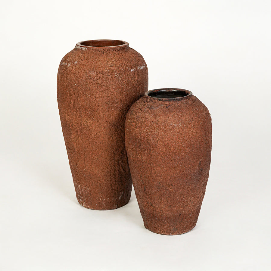 White background image of terracotta ceramic vase set for modern floor decor styling with rustic textured finish.