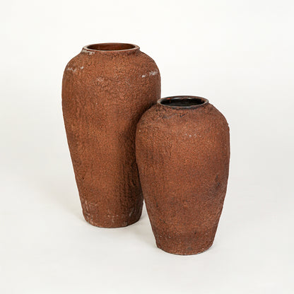 White background image of terracotta ceramic vase set for modern interior decor styling with rustic finish.