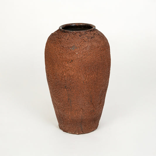 White background image of terracotta ceramic vase for modern floor decor styling with earthy textured finish.