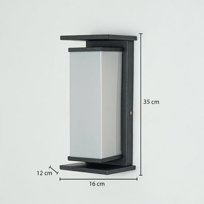 Modern outdoor wall light with rectangular frosted diffuser and black metal frame mounted on wall 35 cm height 16 cm width 12 cm depth ideal for exterior lighting.